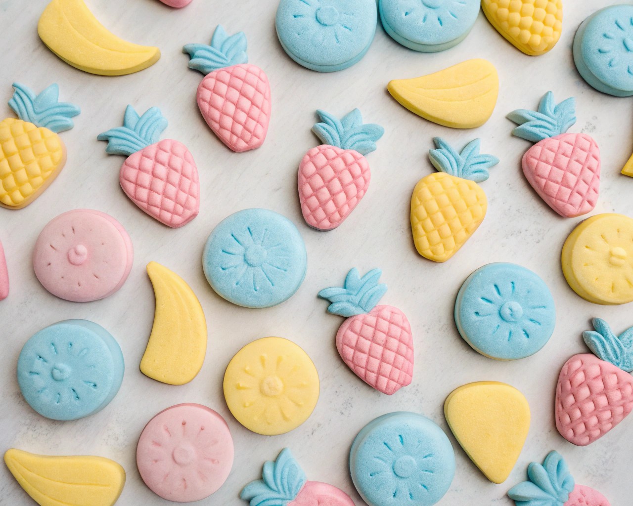 Pastel colors transform classic fruit shapes into chic, modern magnets that brighten spaces effortlessly.